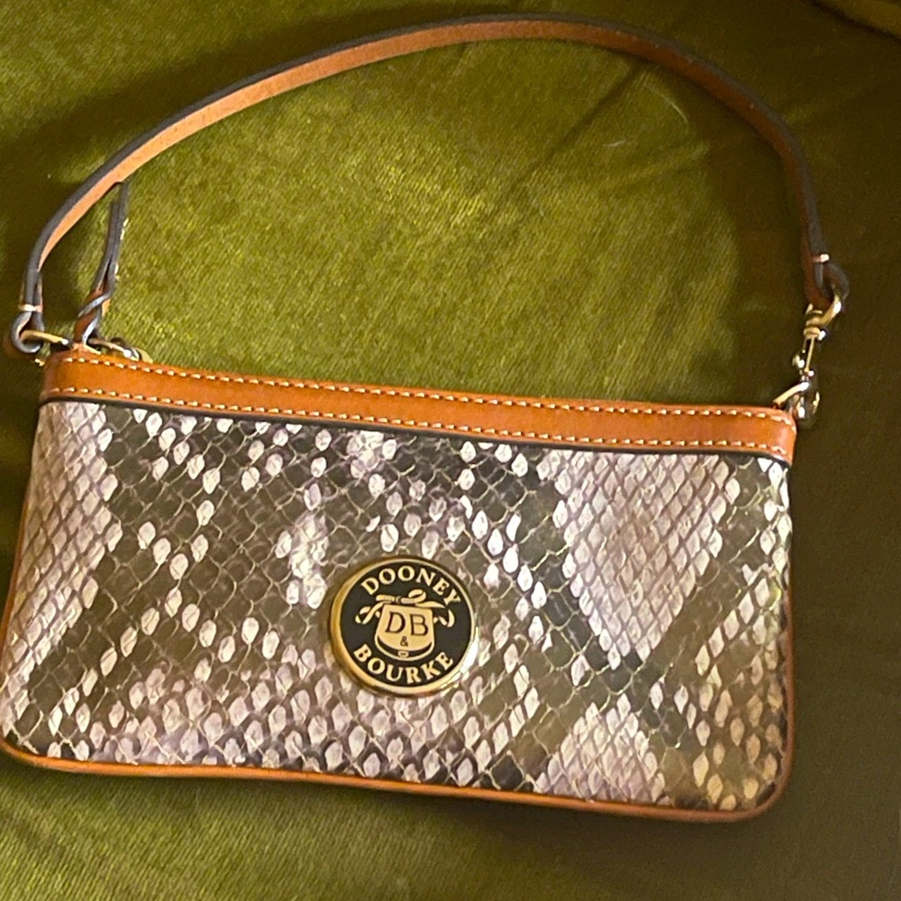Dooney +Bourke  Leather wrislet purse with gold snake skin